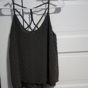 A low neck (cleavage) tank top.